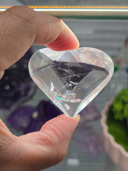 Structured Devotion: Faceted Rainbow Clear Quartz Heart