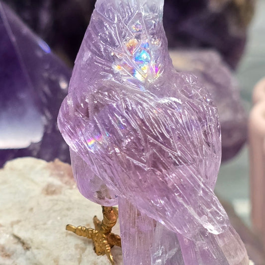 Artistry in Nature: Master-Carved Rainbow Amethyst Toucan